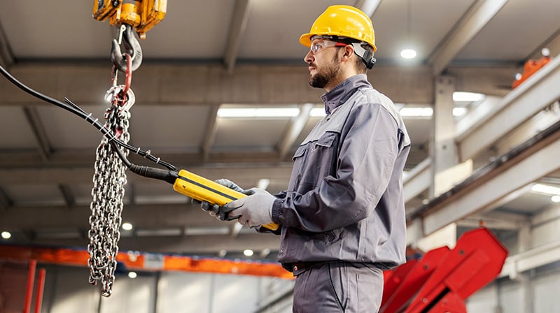 man working factory equipment 